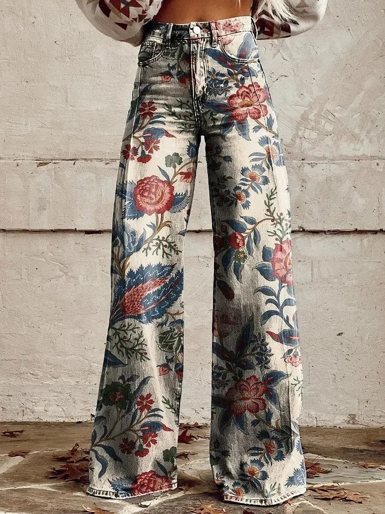 Women's high waist wide leg floral trousers with vintage botanical print featuring oversized florals and foliage motifs in blue, coral, and green tones