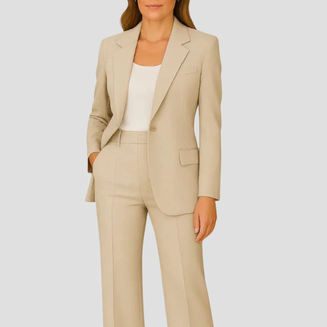 Women's tailored suit set in beige with single-button blazer and wide-leg trousers featuring pressed centre crease