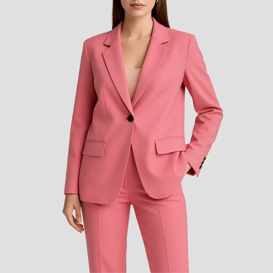 Beige two-piece suit set with fitted blazer and high-waist wide-leg trousers styled for formal occasions