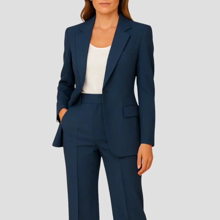 Close-up of tailored blazer with notch lapels and single-button closure in structured beige fabric