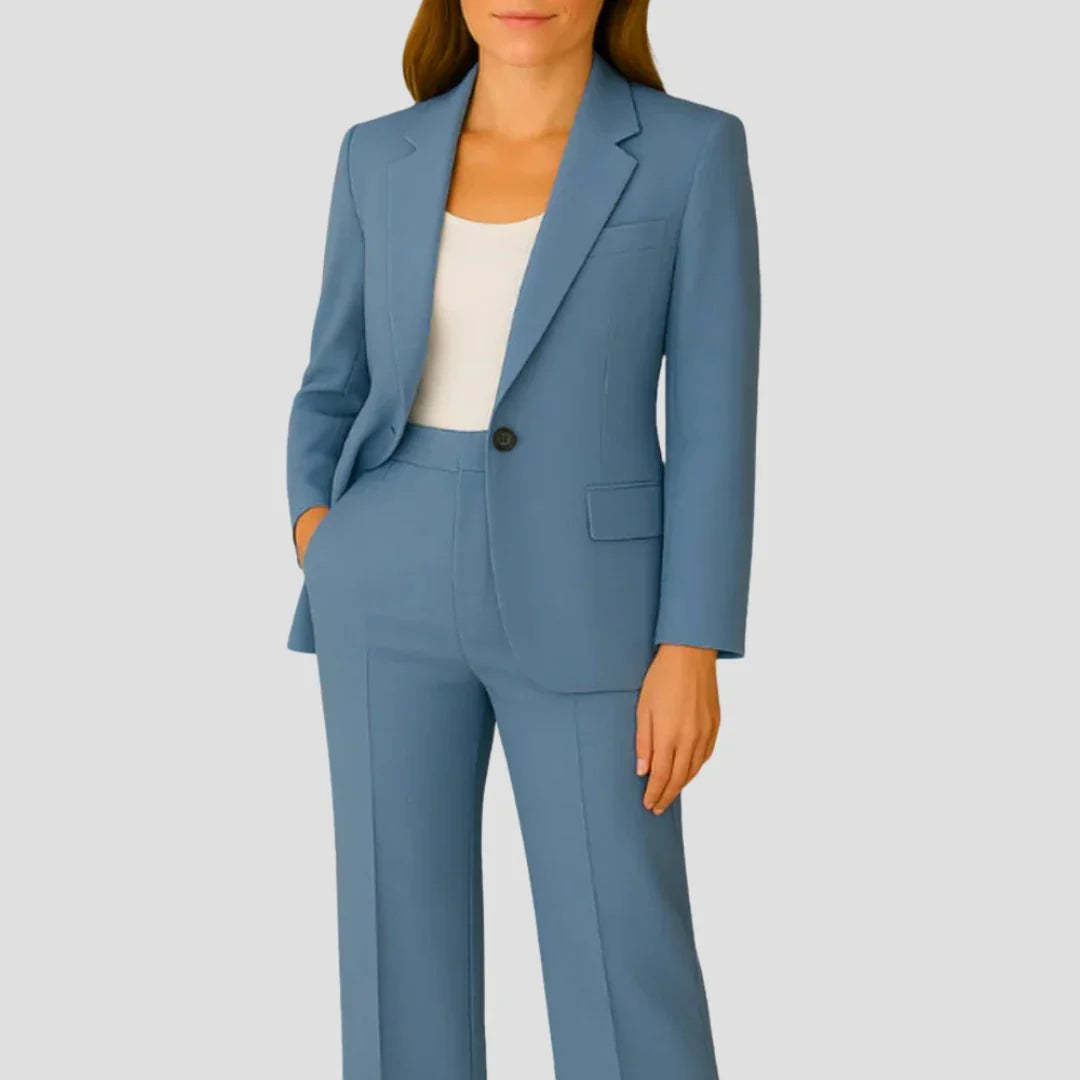 Women's formal suit set showing structured shoulders and tailored waist on blazer with matching trousers