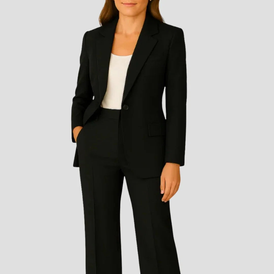 Full-length view of beige tailored suit set with blazer and wide-leg trousers for workwear