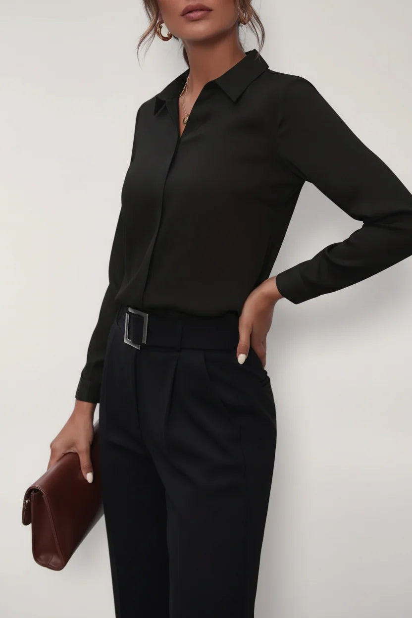 Side view of women's button-up blouse highlighting tailored waist shaping and long sleeves