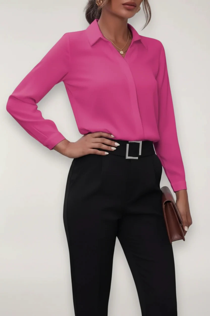 Women's tailored blouse paired with black trousers for office workwear styling