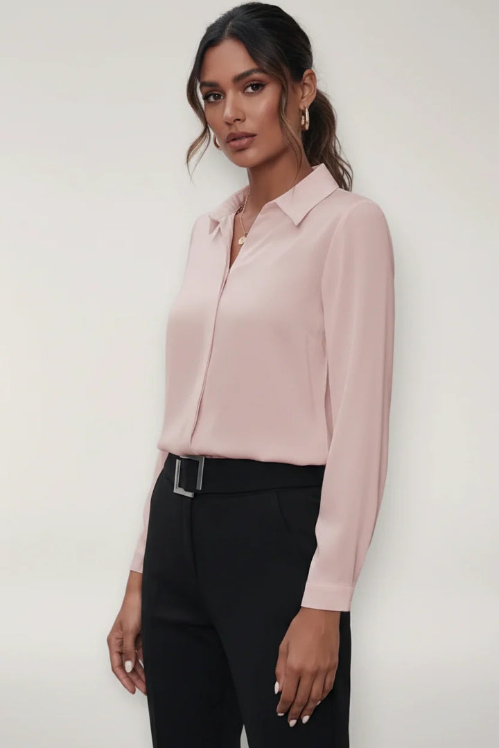 Full-length view of women's button-up blouse showing polished silhouette and fit