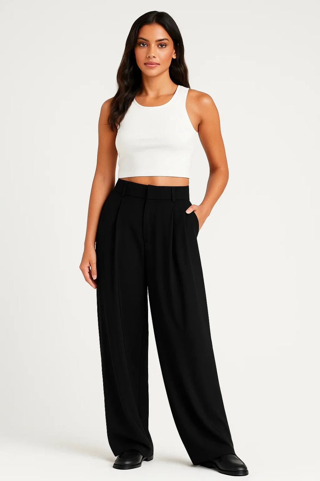 Side view of women's wide leg trousers displaying relaxed silhouette and full-length hem with smooth drape