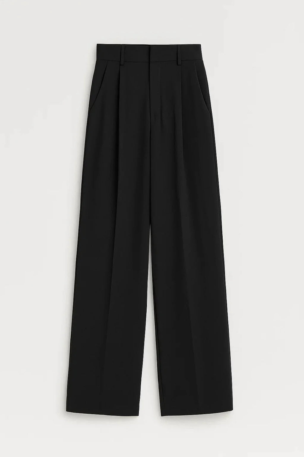 Detail shot of women's wide leg trousers showing side pocket and structured woven fabric finish