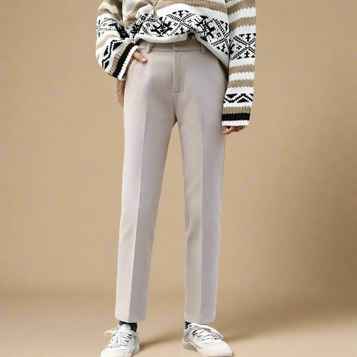Full outfit featuring wool trousers paired with a turtleneck for winter styling