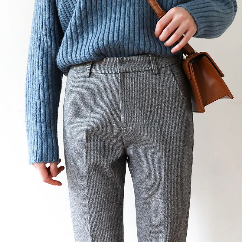 Camel wool trousers styled with neutral tones for a monochrome autumn ensemble
