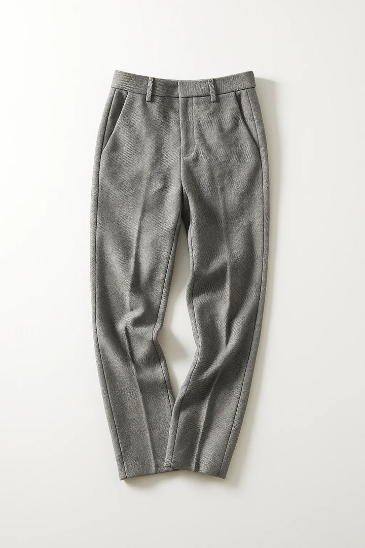 Side view of high-waist wool trousers showing flattering straight-leg silhouette