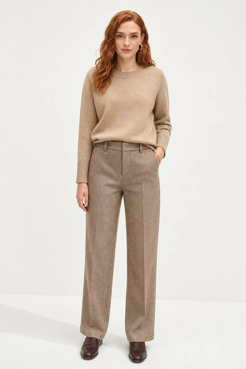 Back view of women's wool trousers showing clean lines and tailored construction