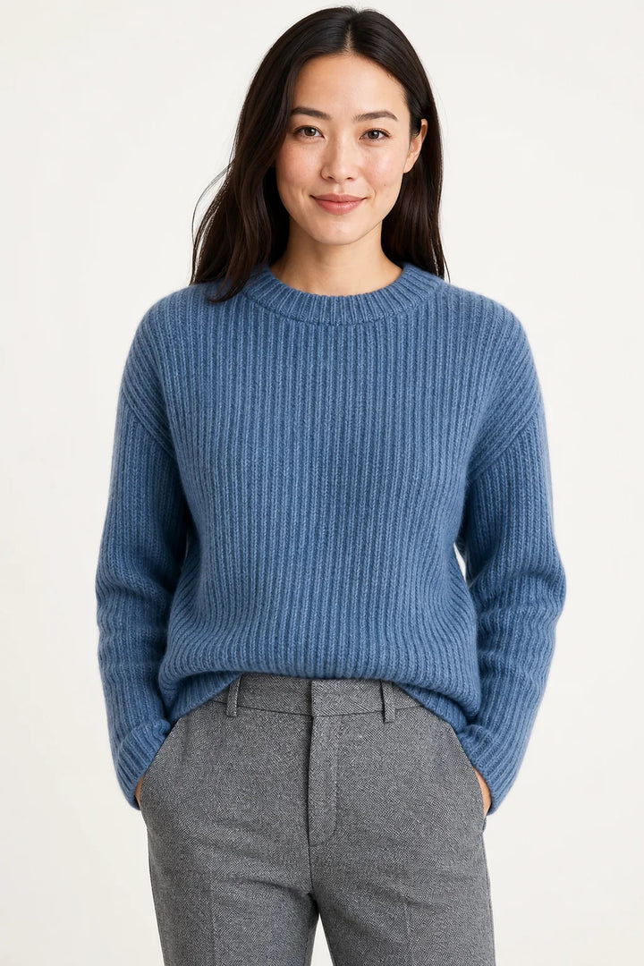 Grey wool trousers with herringbone texture styled for office wear