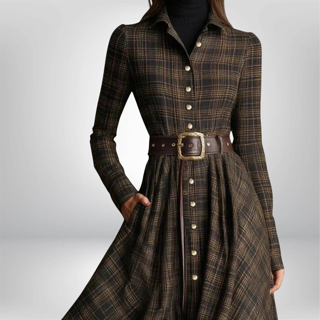 Side view of women's maxi shirt dress with waist-defining belt and flowing skirt