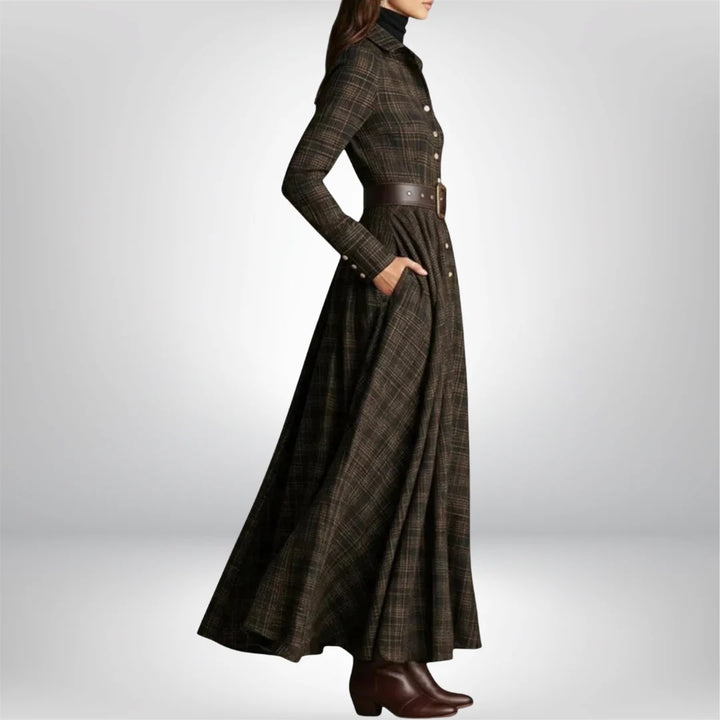 Full-length view of belted shirt dress styled with ankle boots and turtleneck