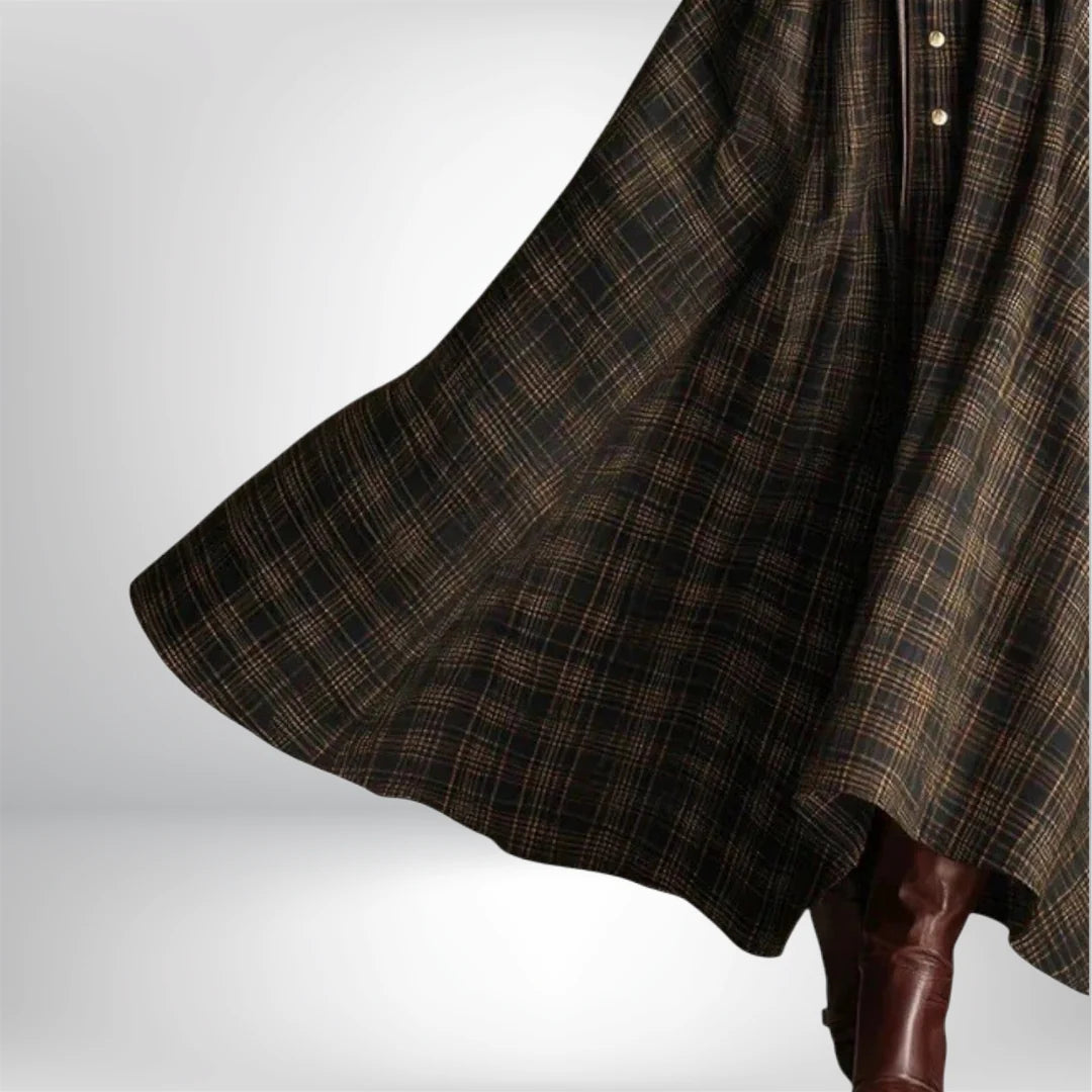 Back view of women's plaid maxi dress showing button-down detail and flowing silhouette
