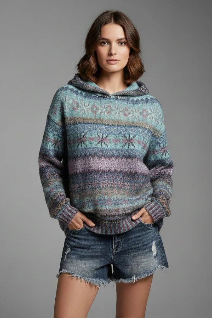 Full-length view of women's patterned hoodie with ribbed detailing and structured hood