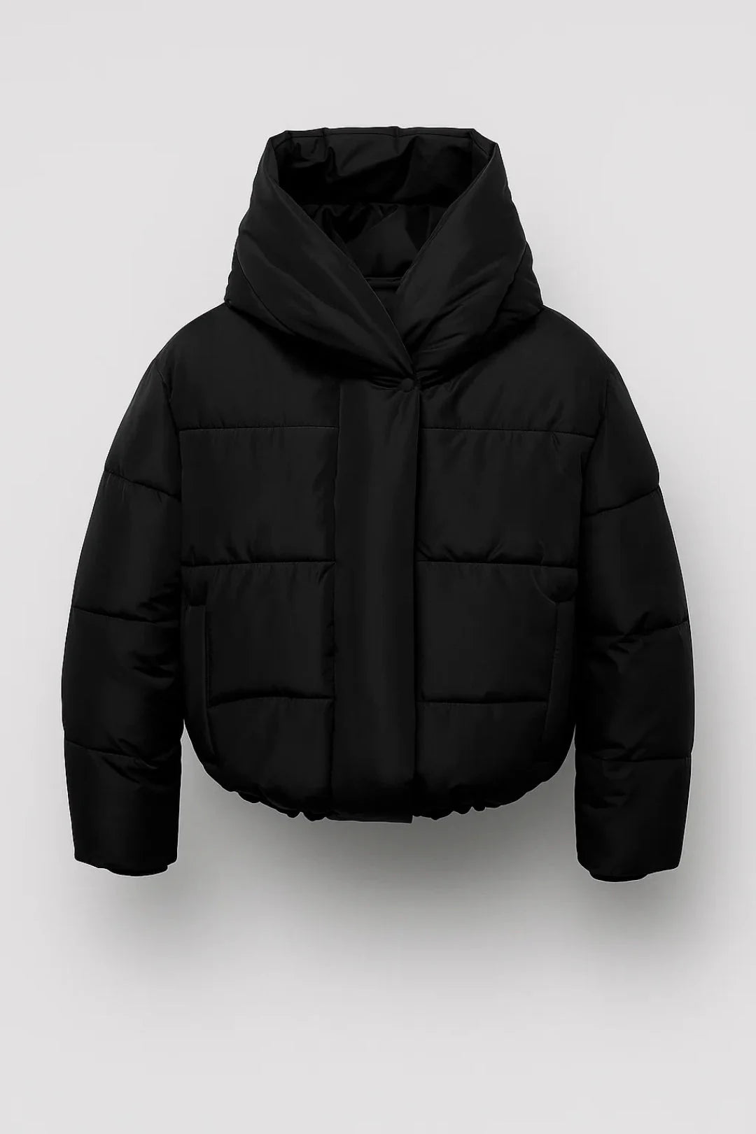 Women's cropped puffer jacket flat lay displaying hooded neckline and padded silhouette in deep burgundy shade