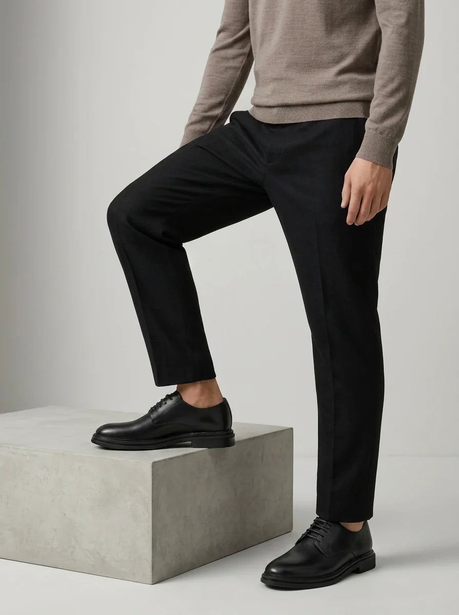 Side view of men's derby shoes showing ankle-high silhouette and structured upper with clean lines