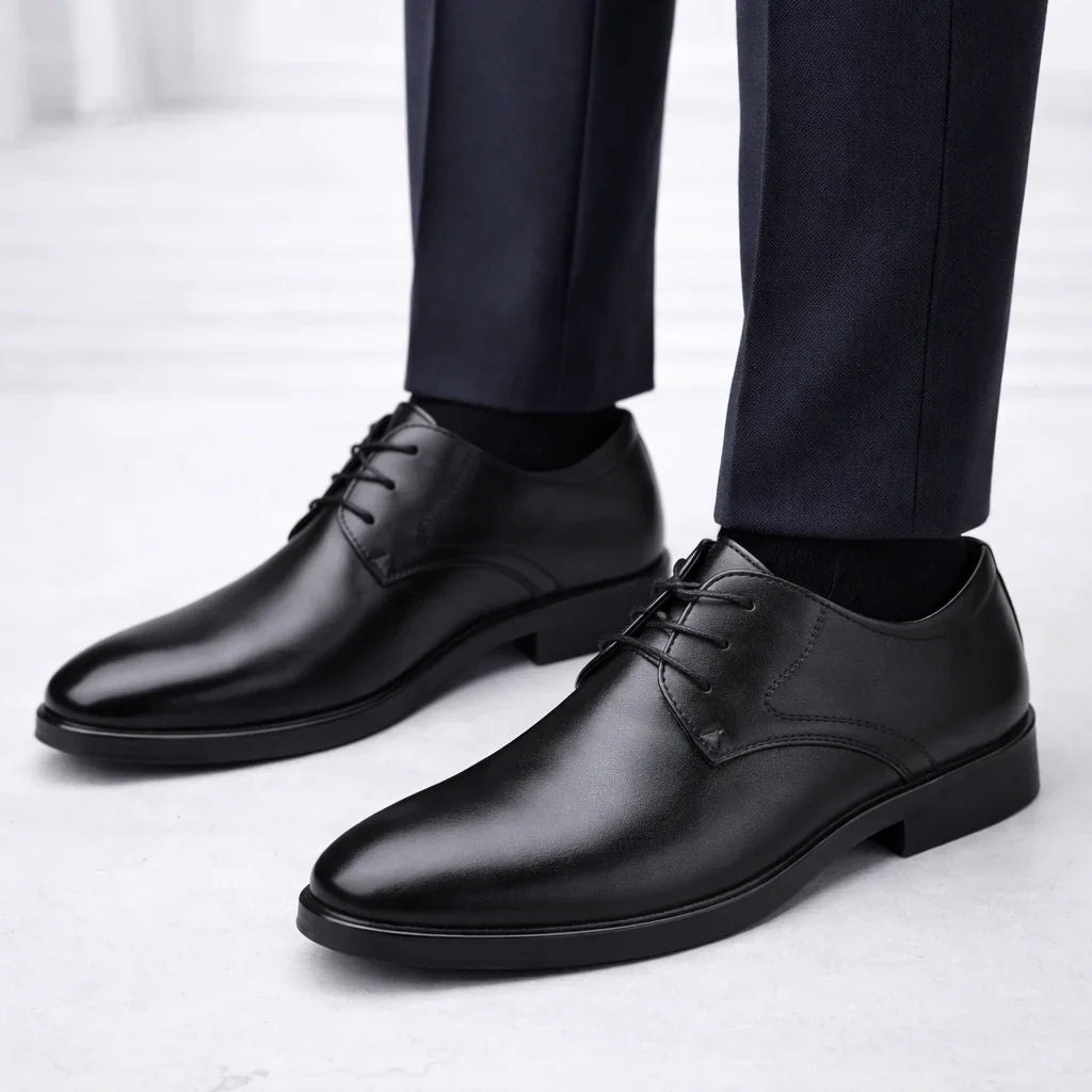 Close-up view of men's brown derby shoes showing classic lace-up design and stacked heel construction