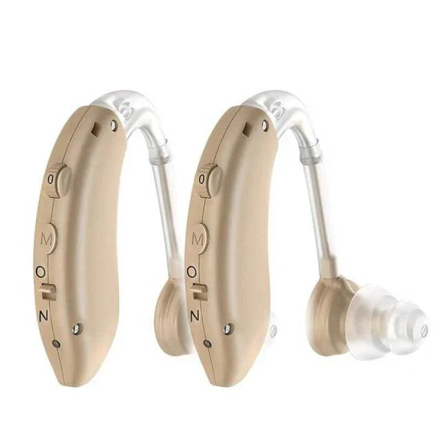 Close-up view of rechargeable hearing aid showing volume controls and charging port detail