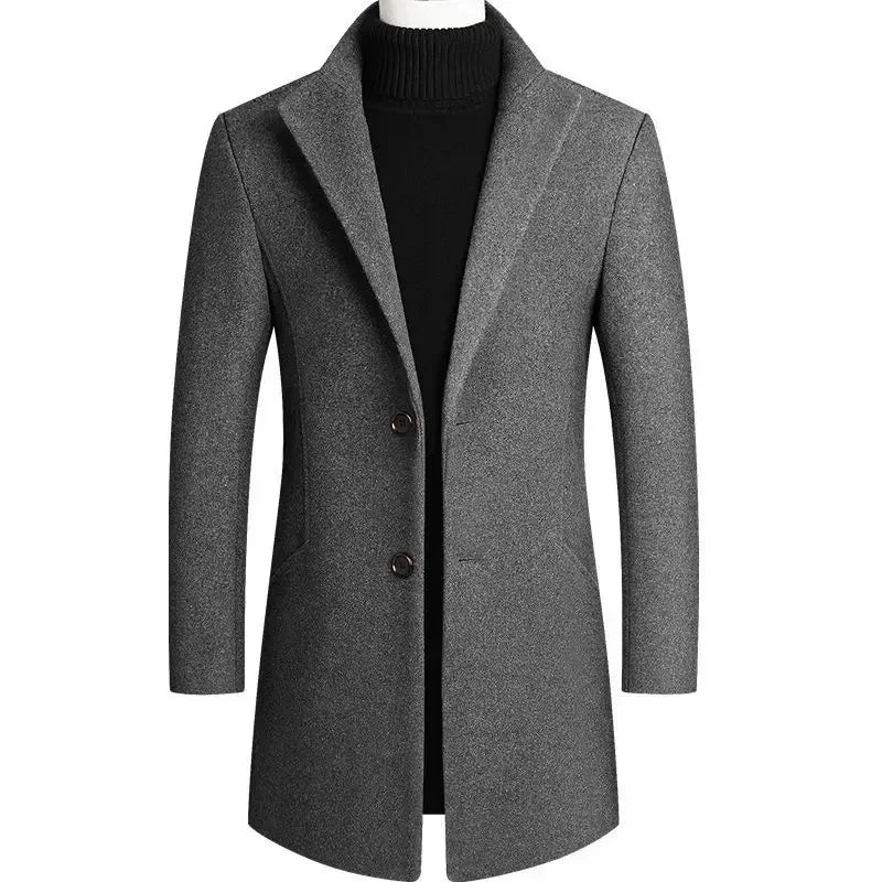 Detail shot of men's overcoat button closure and smooth fabric finish