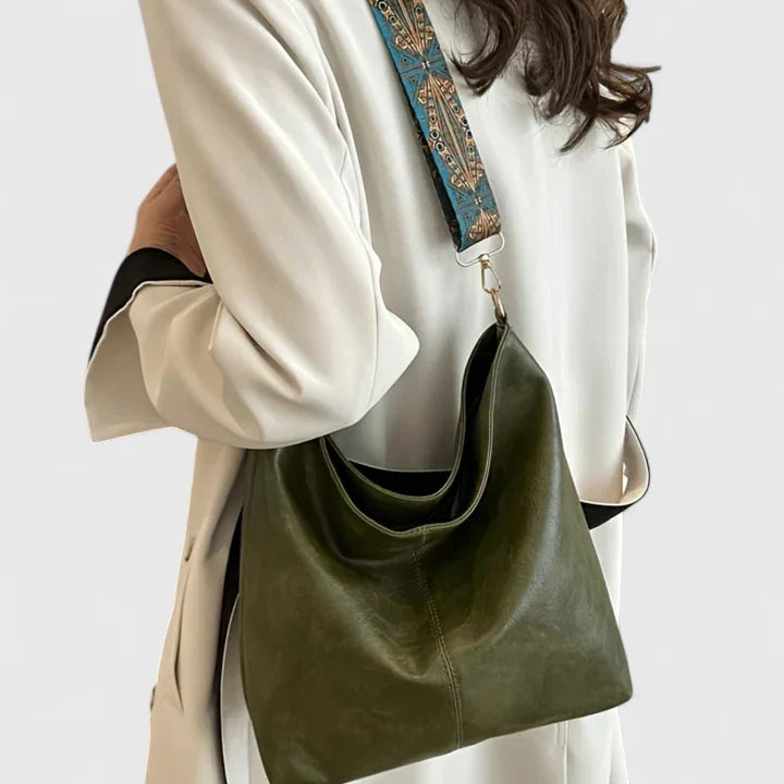 Everyday bucket bag with crossbody strap option and generous storage capacity