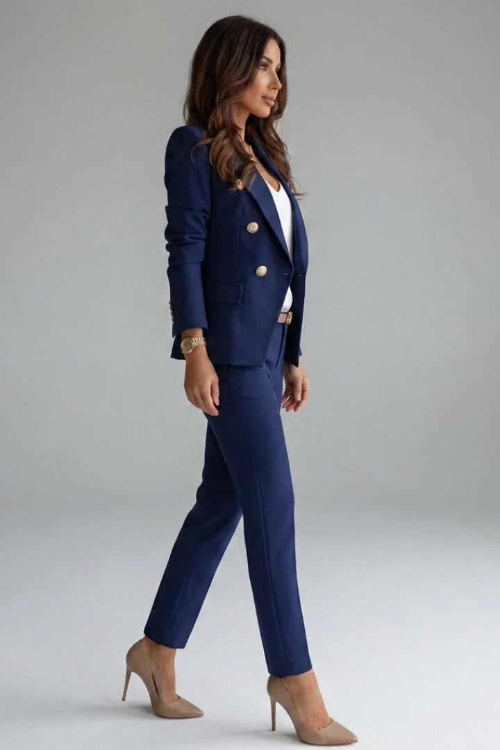Navy structured blazer with notched lapel and six decorative buttons paired with matching straight-leg trousers