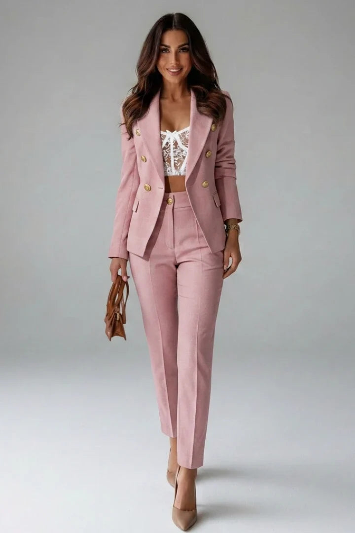 Back view of structured navy blazer from women's double-breasted suit set showing clean tailoring