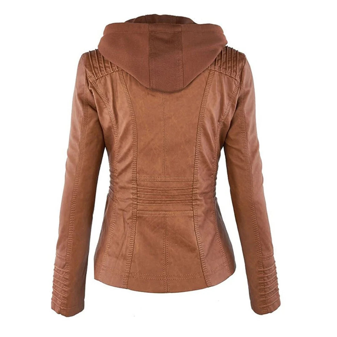 Close-up view of women's hooded biker jacket showing removable hood and multiple zip pockets