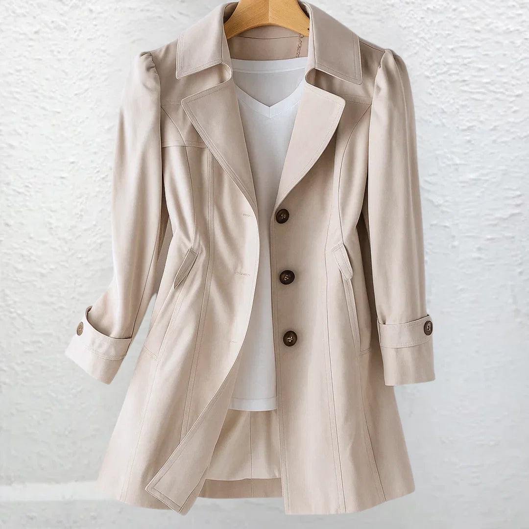 Front view of tailored trench coat in beige with double-breasted styling