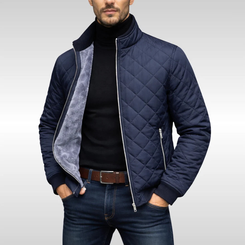 Close-up of diamond quilted pattern and plush fleece lining on men's bomber jacket