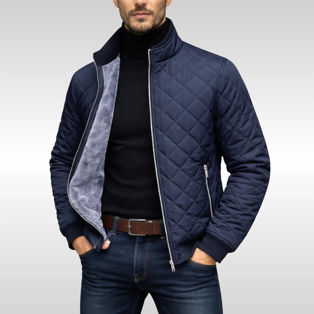Close-up of diamond quilted pattern and plush fleece lining on men's bomber jacket