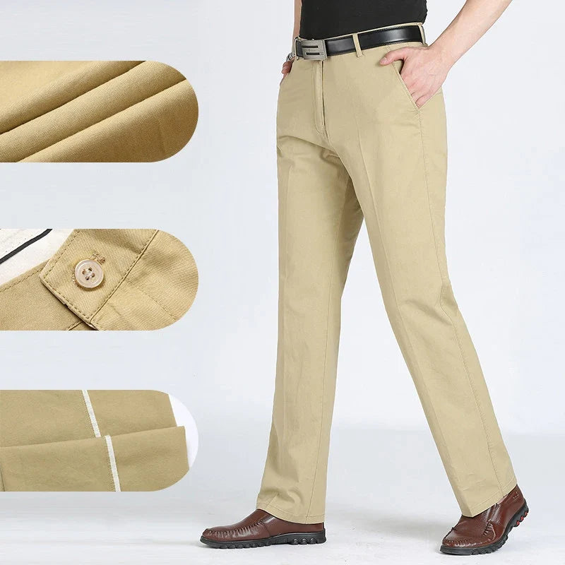 Men's dress trousers in black featuring elasticated waistband and clean front pockets