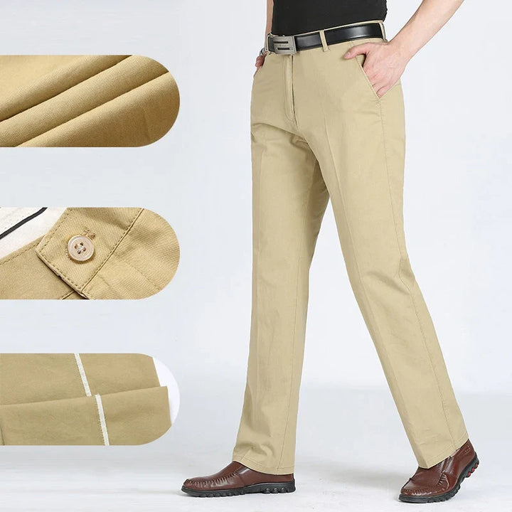 Men's dress trousers in black featuring elasticated waistband and clean front pockets