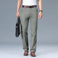 Men's smart casual trousers in light khaki paired with brown leather shoes