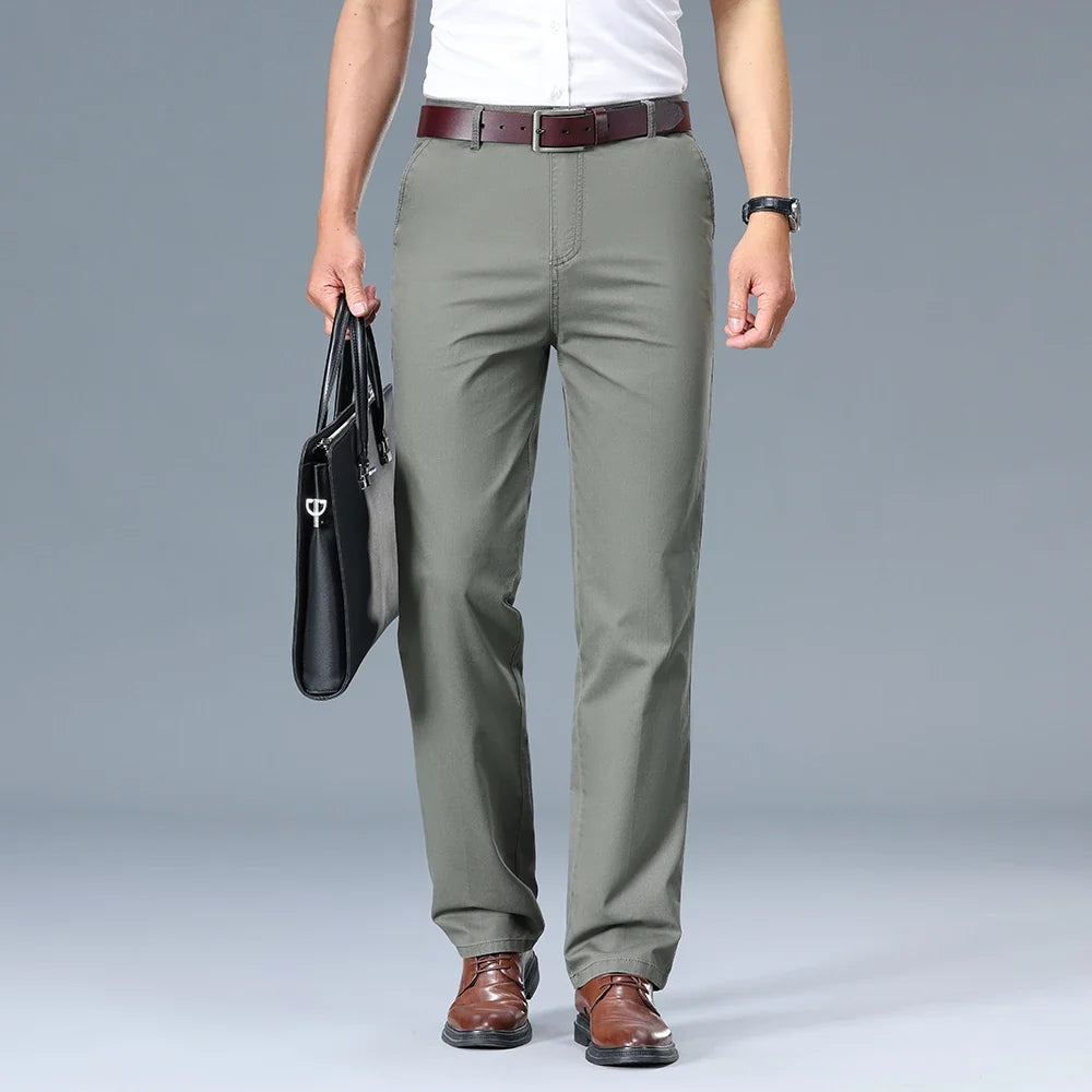 Men's smart casual trousers in light khaki paired with brown leather shoes