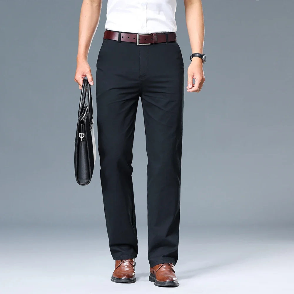Full-length view of men's slim fit dress trousers showing clean lines and refined cut