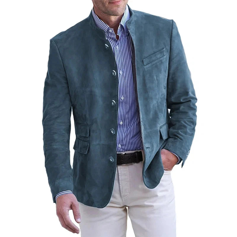 Close-up of men's tan suede-effect blazer showing button-front closure and chest pocket detail
