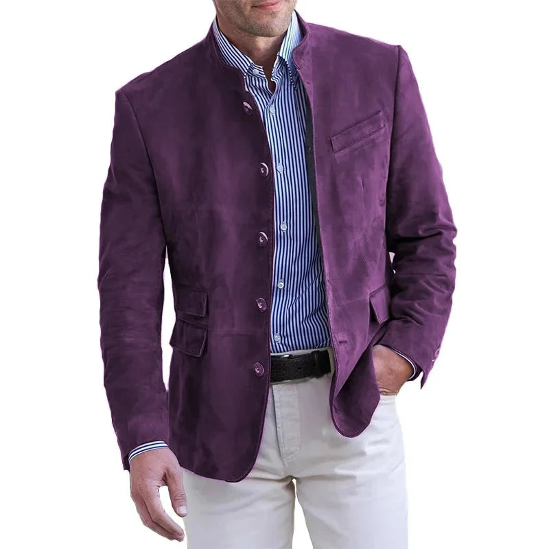 Men's tan blazer with band collar styled with white trousers for smart-casual occasion