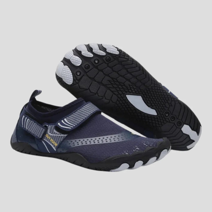 Men's water shoes in navy with textured rubber sole and adjustable strap for secure fit