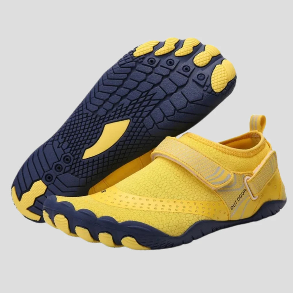 Underside of men's water shoes displaying textured rubber grip pattern for wet surfaces