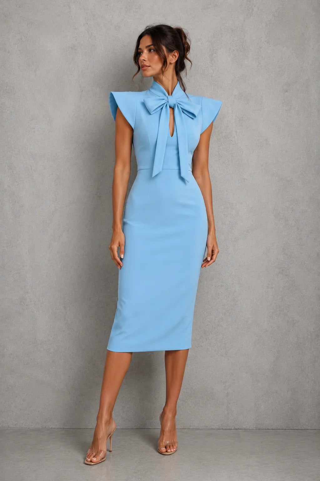 Back view of knee-length midi dress showing structured fit and elegant drape