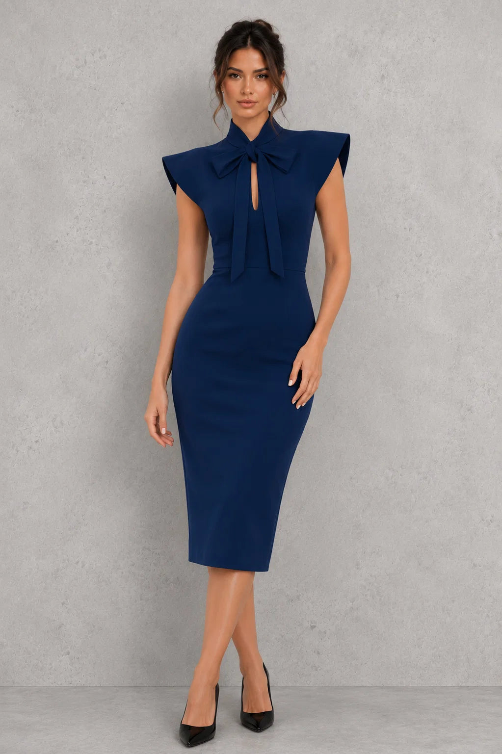 Full-length view of bow tie midi dress styled for occasion wear and formal events