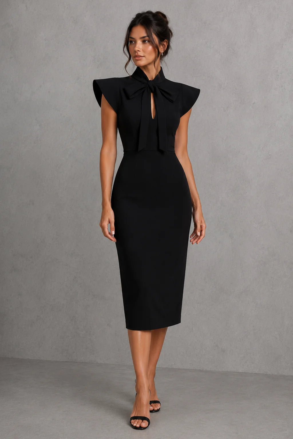 Detail shot of flutter sleeves and smooth fabric finish on tailored midi dress