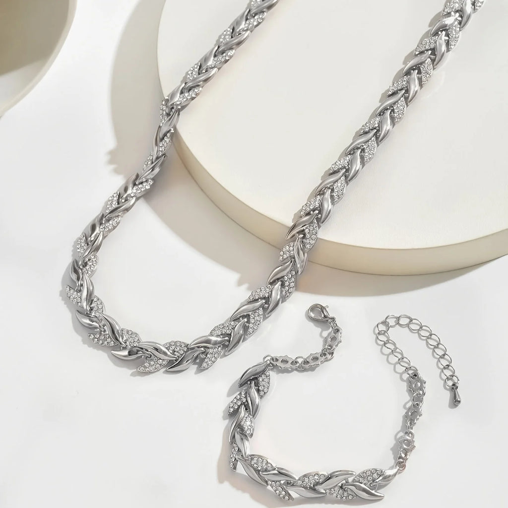 Woman styling rhinestone chain necklace set with evening wear for formal occasion