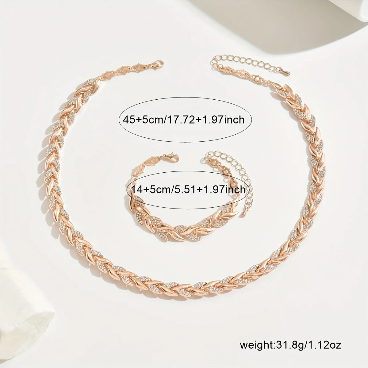 Woman wearing rose gold rhinestone chain necklace set layered with white blouse