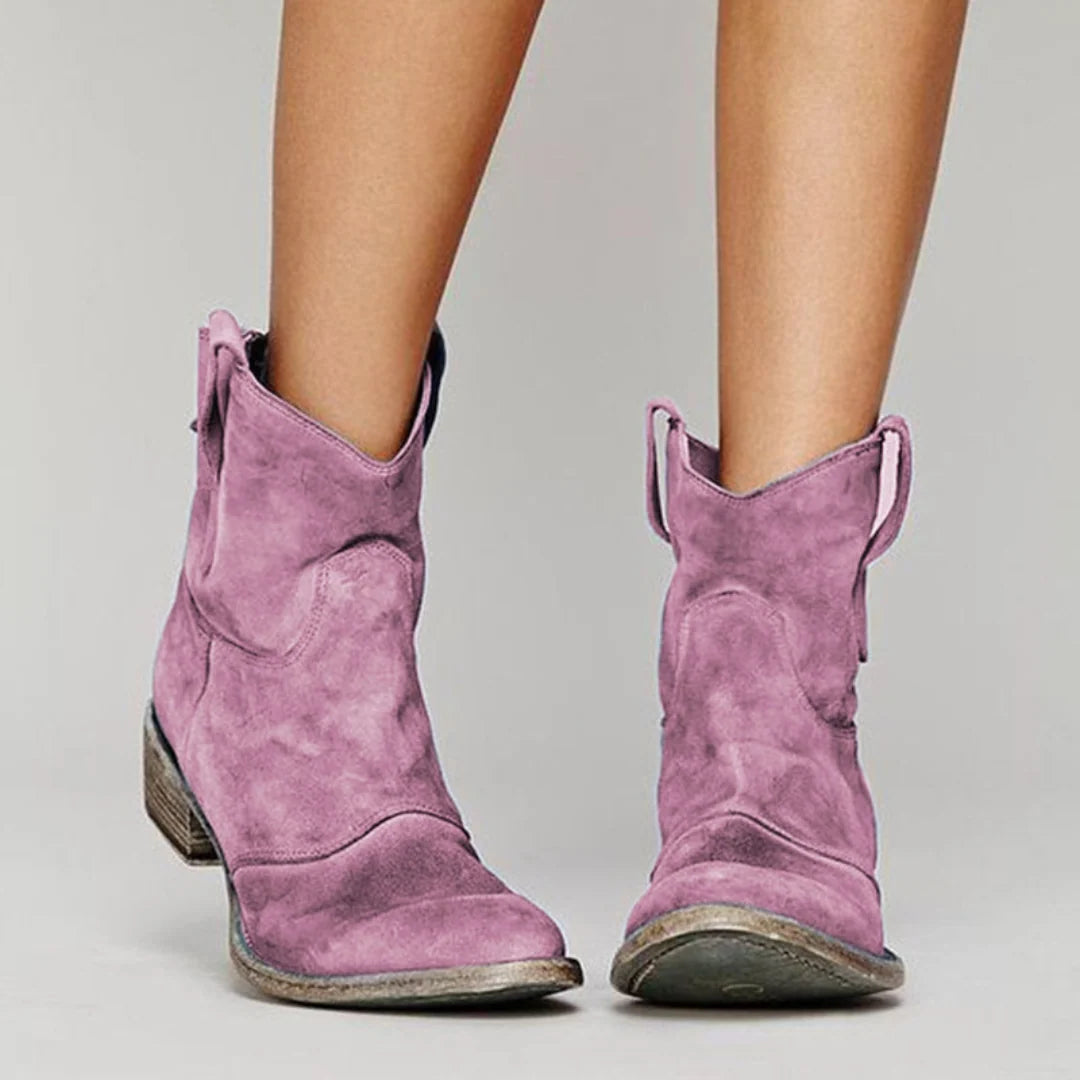 Women's ankle boots in casual western style with rounded toe and block heel construction