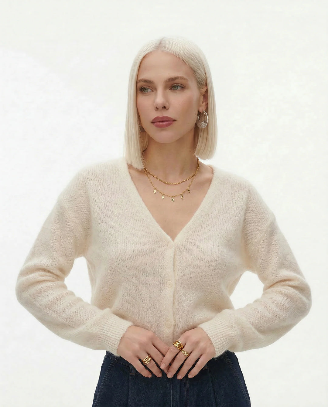 Back view of women's mohair top cardigan in black showing oversized silhouette