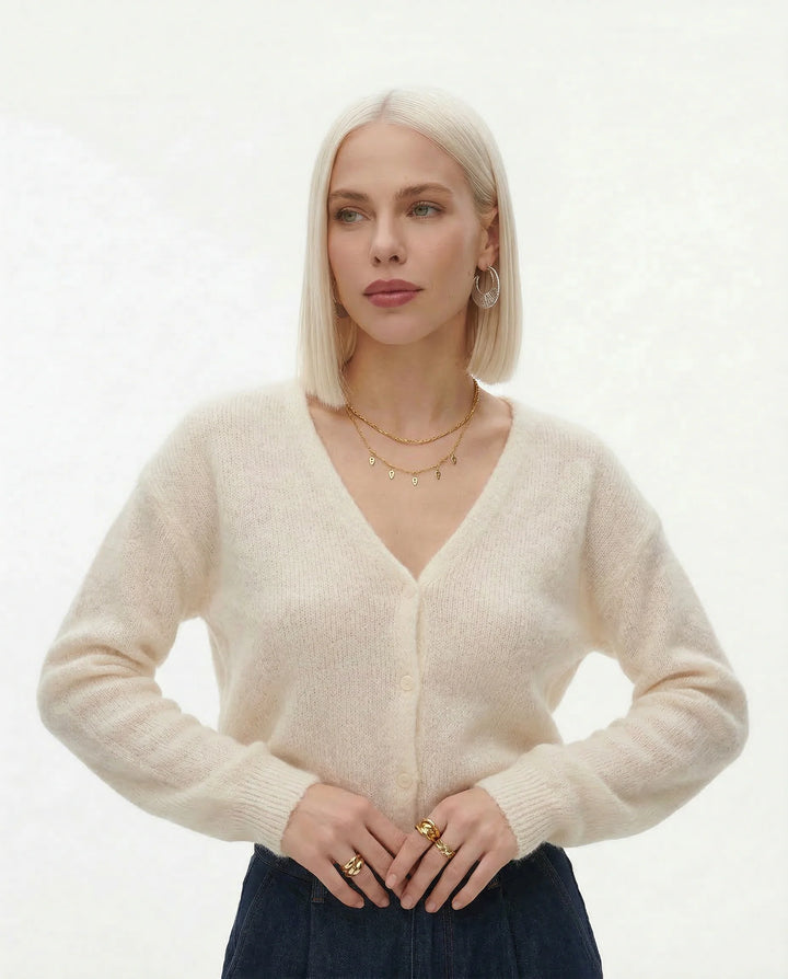 Back view of women's mohair top cardigan in black showing oversized silhouette