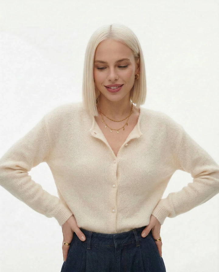 Close-up of button closure and ribbed cuffs on mohair top cardigan